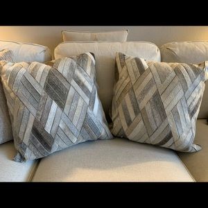 Two gray cow hide pillows. Never used.